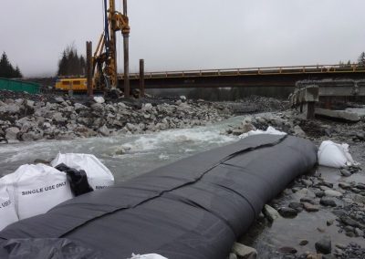 Dam bags isolating the in-water work site at Bitter Creek